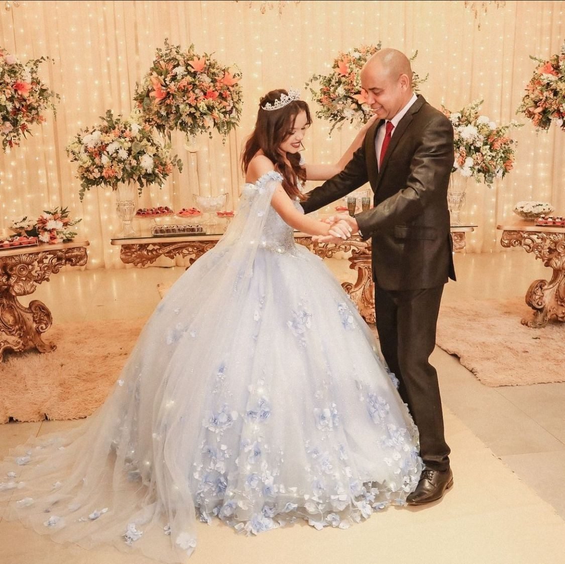 Debutante dançando com o pai
